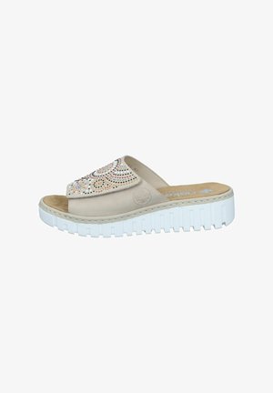 Beige slide sandal with multicolored rhinestone embellishment on the upper. Features a white platform sole with textured details.