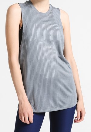 Gray sleeveless athletic top with vertical stripes and "JUST DO IT" printed in a reflective finish. Soft fabric with a relaxed fit.