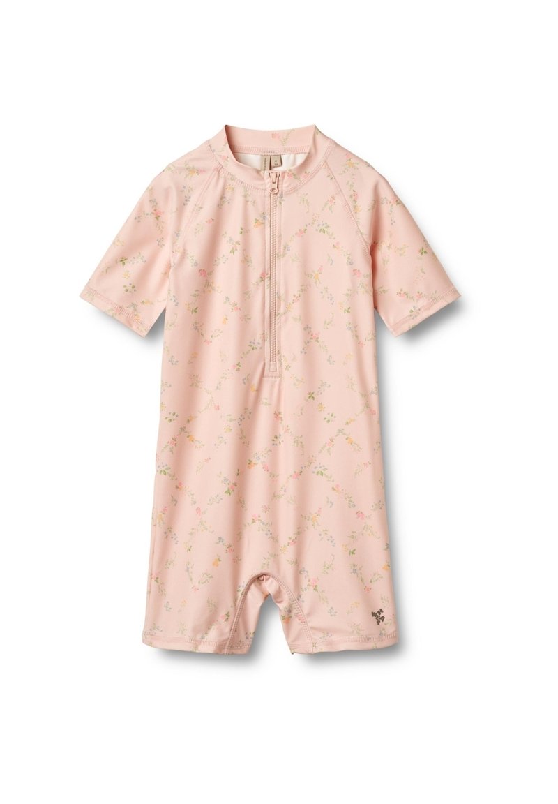 Combinaison à manches courtes en tissu extensible de couleur rose, ornée d'un motif floral, avec une fermeture éclair à l'avant et un bas élastique pour un enfilage facile.