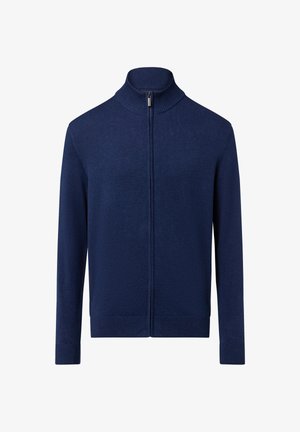 Sweat à zip bleu marine avec un col haut et des poignets côtelés. Le tissu semble lisse avec une texture subtile et se termine à la longueur des hanches.