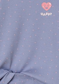 Lavender ribbed fabric with small pink dots and a smiling pink heart above the word "HAPPY" near the top right corner.