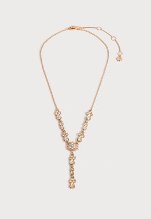 Halskette in Goldton mit tropfen- und rundförmigen Kristallverzierungen, die einen y-förmigen Anhänger bilden, verstellbare Kette mit Sonnen-Schließe.