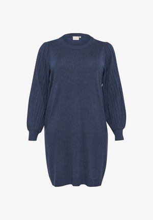 Jūras zilas adītas kleitas ar ribotām bumbveida piedurknēm, apaļu kakla izgriezumu un taisnu siluetu, ar mīkstu tekstūru un brīvu piegriezumu.