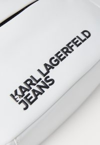 Karl Lagerfeld Jeans ESSENTIAL UNISEX - Axelremsväska - white