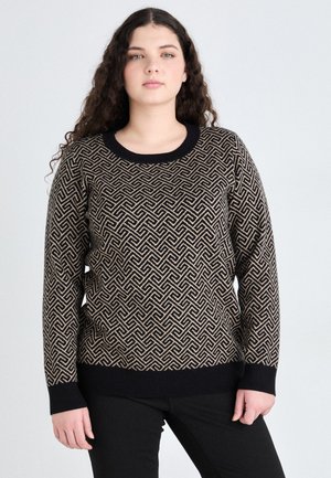 Strickpullover mit geometrischem Muster in Schwarz und Beige. Mit einem runden Ausschnitt sowie gerippten Bündchen und Saum, kombiniert mit schwarzen Hosen.