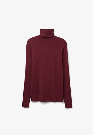 Burgundy turtleneck sweater made of textured knit fabric, featuring long sleeves and side slits at the hem for ease of movement.