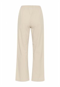 Beige wide-leg trousers with an elastic waistband and smooth texture, featuring a straight cut and no visible pockets or seams.