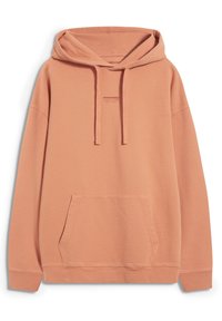 Jasno brzoskwiniowy sweatshirt z kapturem wykonany z miękkiego materiału. Posiada kieszeń z przodu, sznurki do regulacji oraz subtelnie nadrukowane logo na piersi.