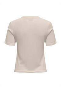 Lys beige kortærmet T-shirt, lavet af blødt bomuldsstof. Har en rund halsudskæring og syninger langs ærmerne og kanten.