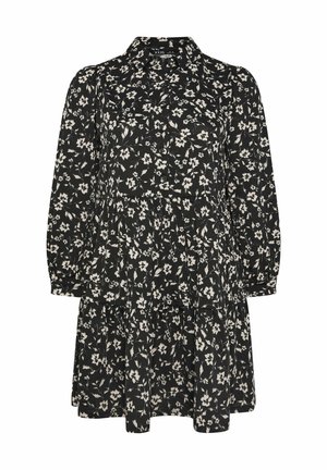 Czarna sukienka w kwiaty z długimi rękawami, kołnierzykiem, zebranymi warstwami i zapięciem na guziki. Posiada biały wzór kwiatowy na ciemnym tle.
