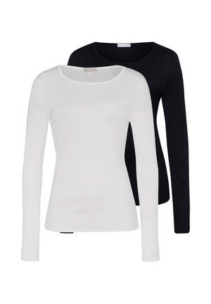 Due top da donna a manica lunga tinta unita, uno bianco davanti e uno nero dietro, entrambi con scollo rotondo.