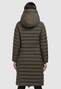 Brown, puffy long coat with a hood, featuring horizontal stitching, sliding zipper, and side pockets. Smooth texture and warm insulation.