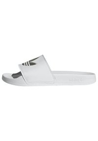 White slide sandal made of smooth material, featuring a wide strap with three black stripes and textured footbed. Slightly raised sole.