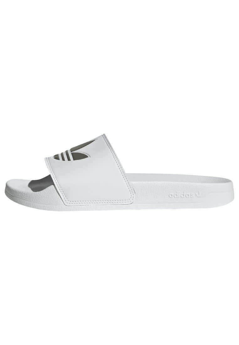 White slide sandal made of smooth material, featuring a wide strap with three black stripes and textured footbed. Slightly raised sole.