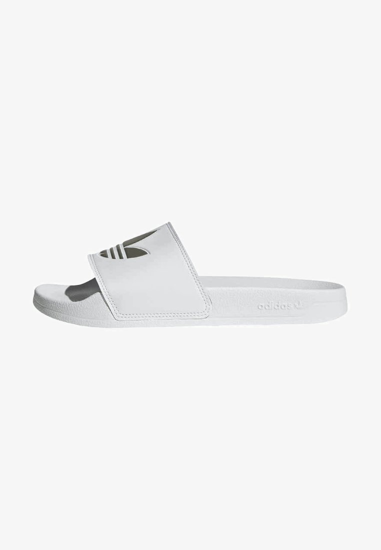 White slide sandal made of smooth material, featuring a wide strap with three black stripes and textured footbed. Slightly raised sole.