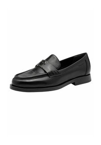 Black leather loafers with a rounded toe, decorative strap with buckle, and stitched detailing along the upper, featuring a flat, textured sole.