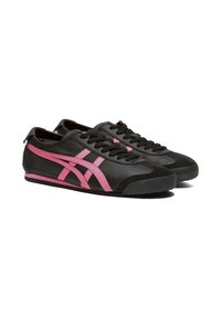 Black athletic shoes made of leather with pink accents. Features include a rounded toe, flat black sole, and black laces.