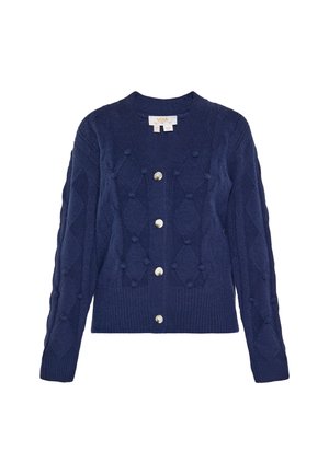 Navy blue knitted cardigan with long sleeves, diamond pattern, small pom-poms, and five white buttons down the front.