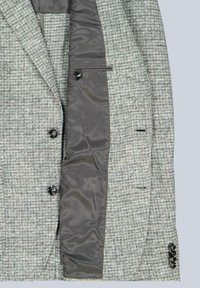 Grau kariertes Hahnentritt-Sakko mit Satinfutter, zwei Knöpfen vorne und drei dekorativen Knöpfen an jedem Ärmelabschluss.