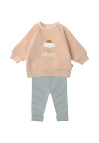 Peach sweatshirt with floral "AMORE" graphic, paired with light blue and white striped leggings. Soft fabric and ribbed cuffs.