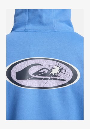 Hoodie bleu en tissu doux avec un grand logo graphique noir et lilas fissuré au dos. Sweat à capuche avec cordon de serrage.