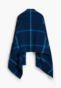 Poncho à carreaux bleu marine avec un tissage texturé, présentant des rayures légères bleues horizontales et verticales et un design ouvert à l'avant.