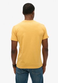 Superdry & Co WORKWEAR FLOCK GRAPHIC  - Camiseta estampada - amber yellow marl