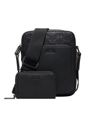 Sac bandoulière noir ALDO avec un motif logo texturé et un portefeuille zippé assorti, tous deux avec une bandoulière large réglable et un tire-zip argenté.