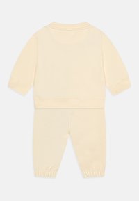 Calvin Klein Jeans MONOGRAM UNISEX SET - Melegítő - afterglow/pink sand