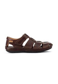 Braune Leder-Sandale mit offenem Design, featuring mehrere Riemen, genähte Details und eine strukturierte Sohle. Abgerundete Zehenpartie und Knöchelunterstützung.
