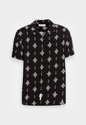 Short-sleeved shirt in black fabric featuring a geometric white and red diamond pattern, with a buttoned front and a camp collar.
