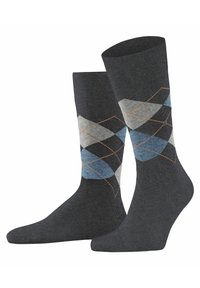 Szare skarpetki w wzór argyle z jasnoszarymi, niebieskimi i pomarańczowymi diamentami. Miękki materiał z prążkowanymi mankietami i gładką teksturą.
