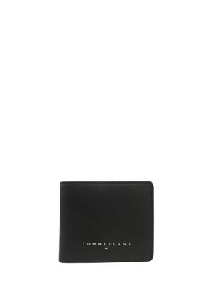 Cartera de cuero negra con textura suave, que presenta un logo en relieve blanco "TOMMY JEANS" en la parte frontal y un diseño minimalista.
