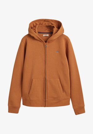 Sweat à capuche marron à fermeture éclair avec poches avant, poignets côtelés, une capuche et un petit logo brodé sur le côté gauche de la poitrine.