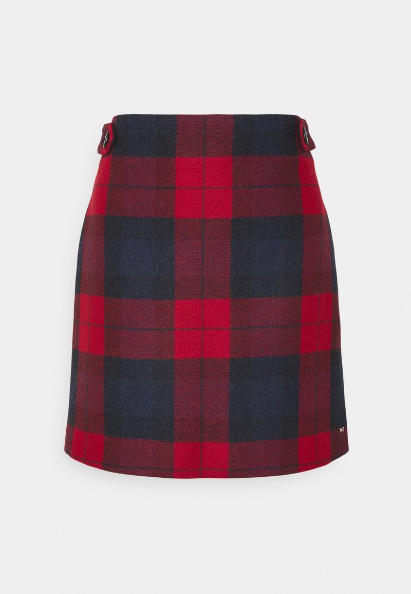 Jupe plaid tartan rouge et bleu marine avec taille haute et détails de boutons de chaque côté, longueur genou, coupe droite.