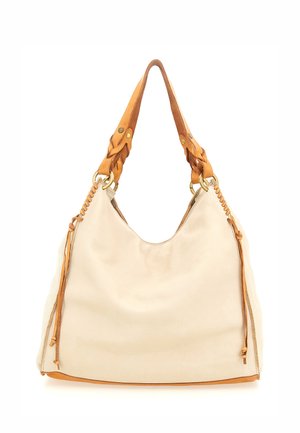 Borsa a tote color crema con una texture morbida, caratterizzata da manici in pelle marrone intrecciata e frange decorative, accentuata da accessori in oro.