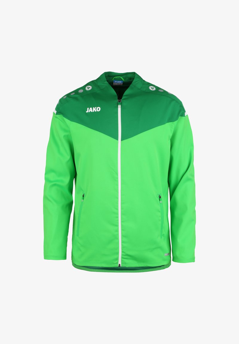 Groene sportjack met een gladde textuur, contrasterende donkerdere groene schouderstukken en rits, logo op de borst, en twee ritszakken aan de zijkant.