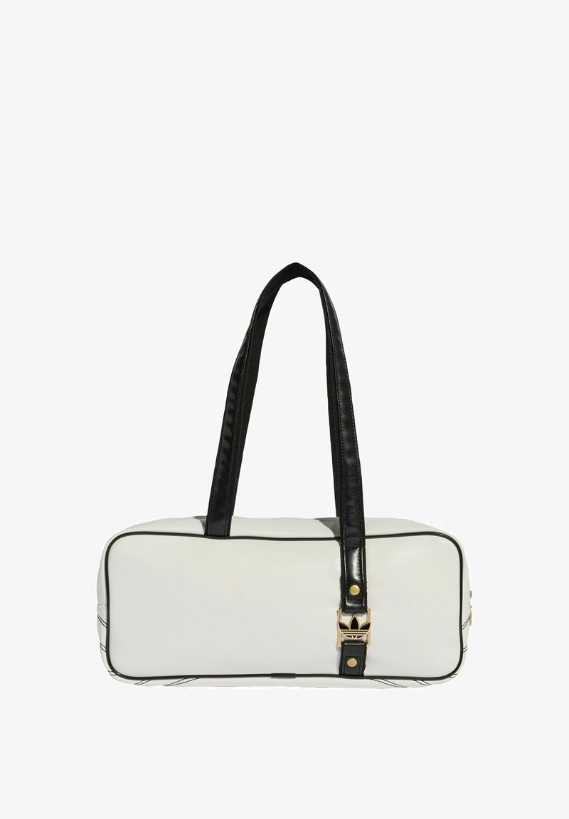 White rectangular bag with black trim and handles. Features a gold clasp with a logo and contrasting stitching on the side. Smooth texture.