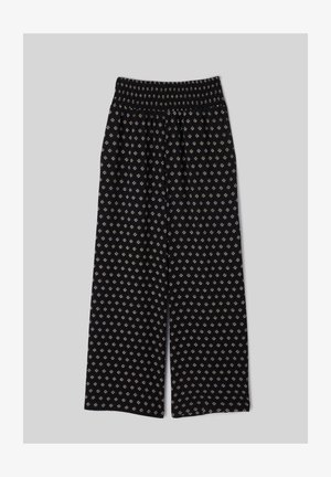 Pantalon noir à jambes larges avec une ceinture smockée élastique et un petit motif losange clair sur toute la surface.