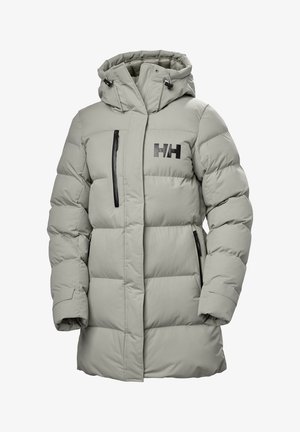 Doudoune grise avec capuche, dotée de zippers noirs et d'un logo HH sur la poitrine. Elle présente un design matelassé et une coupe décontractée.