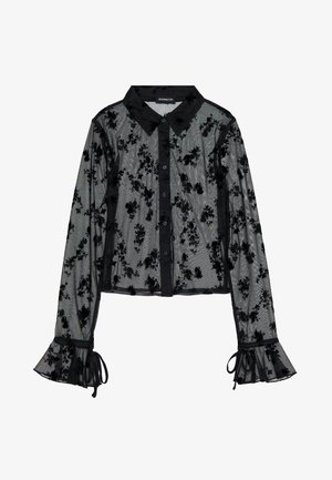 Melna caurspīdīga blūze ar ziedu rakstiem, pogu aizdare, uzvalks un izplūdušas piedurknes. Izgatavota no delikāta auduma ar tekstūras akcentiem.