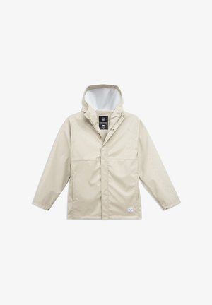 Veste imperméable beige avec capuche, fermeture à boutons pressions à l'avant, deux poches avant et une texture lisse. L'intérieur présente une doublure contrastante.