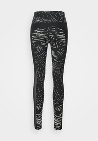 Czarne legginsy z wysokim stanem, z białym teksturowanym wzorem, posiadające siateczkowe wstawki po bokach oraz gładką talię.