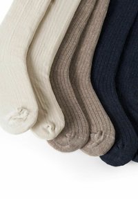 Chaussettes en coton de quatre couleurs : crème clair, beige, marron moyen et bleu marin foncé. Texture côtelée, orteils renforcés et finition lisse.