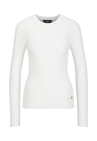 Witte geribbelde top met lange mouwen, een ronde halslijn en een gouden logo-accent aan de zoom. Zachte textuur en getailleerd ontwerp.