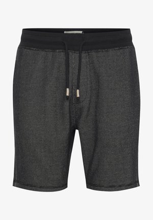 Zwarte mesh shorts met een tailleband met trekkoord, gemaakt van een lichtgewicht, ademend materiaal en een klein geperforeerd patroon overal.