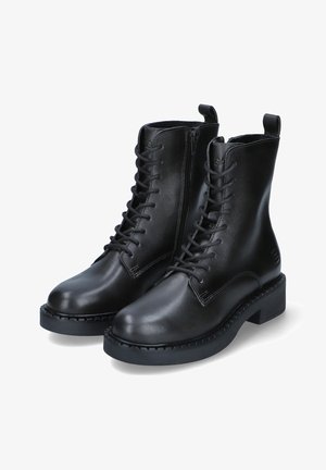 Schwarze Leder-Stiefeletten mit einer glatten Textur, ausgestattet mit einer Schnürung vorne, einem seitlichen Reißverschluss und einer robusten Gummisohle mit gezacktem Rand.