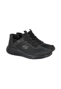 Zapatillas deportivas negras con parte superior de malla y suela de goma. Incluyen un diseño texturizado, cordones elásticos y un logotipo en el costado.