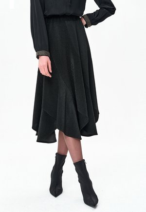 - Spódnica trapezowa