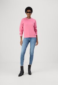 Lacoste Sportska majica - reseda pink